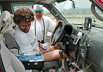 Locating satellite transmitters from ground